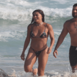 Juliana Paes e o marido Carlos Eduardo curtem praia no RJ