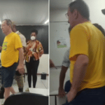 Eleitor vestido de verde e amarelo é detido após chamar mesária de 'piranha' e 'negra incompetente'